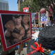 A protester carries a sign depicting Vladimir Putin and President Donald Trump during the Impeachment March calling for Trump’s impeachment on July 2, 2017, in Los Angeles. (David McNew/Getty Images)